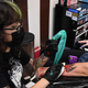Image for article titled This woman, owner of the world's most unfortunately timed tattoo, exemplifies human resilience